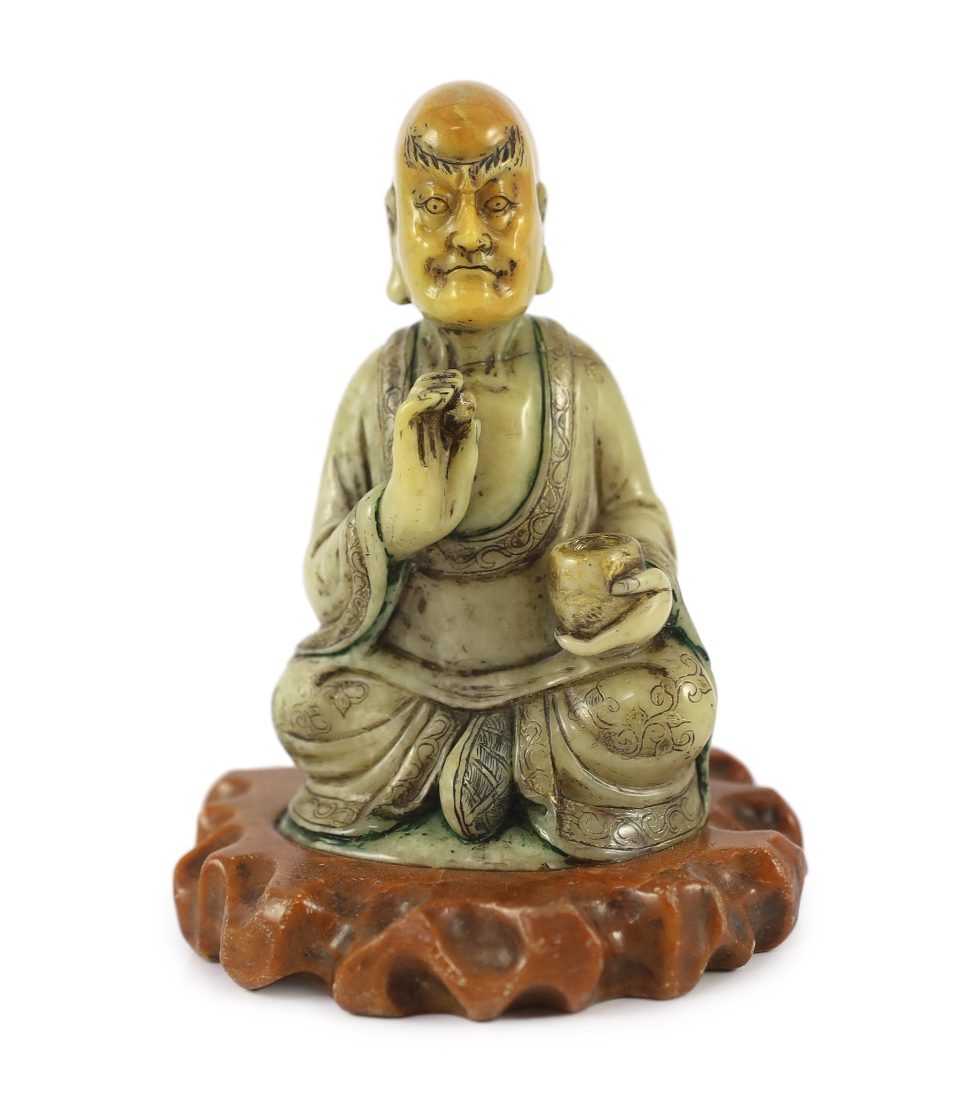 A Chinese soapstone seated figure of a luohan, 18th century